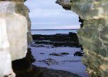 Another view of the beaches, through a gap in the cliffs